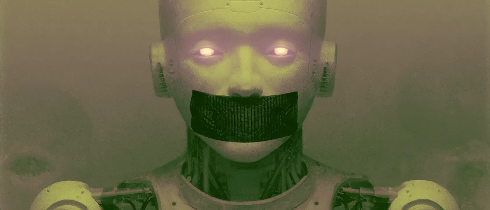 A humanoid robot with glowing eyes and its mouth taped shut, tinted sickly green
